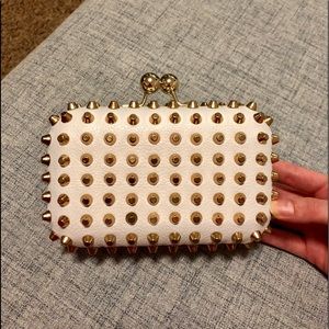 Gold studded clutch